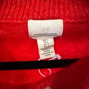 H&M bright, loose sweater. Size: Large